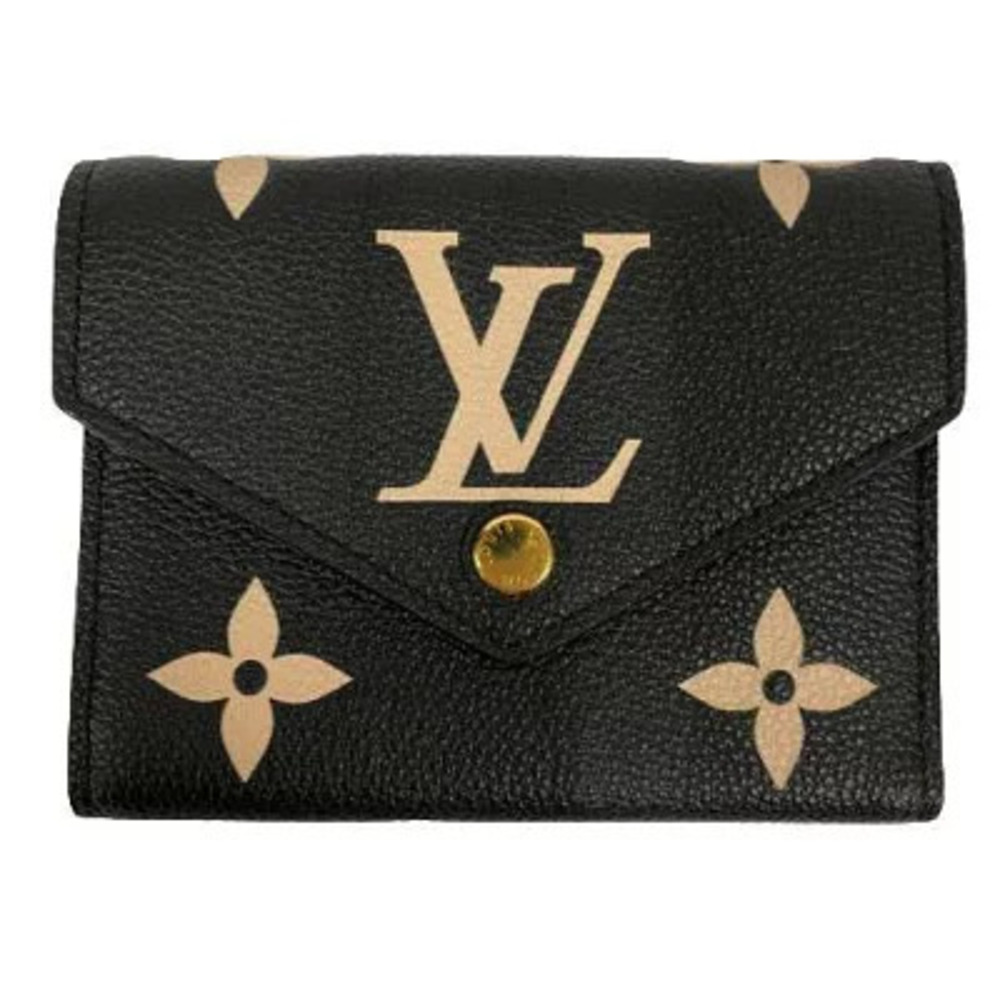 LOUIS VUITTON Portefeuille Victorine Monogram Empreinte Bicolor Leather Gold